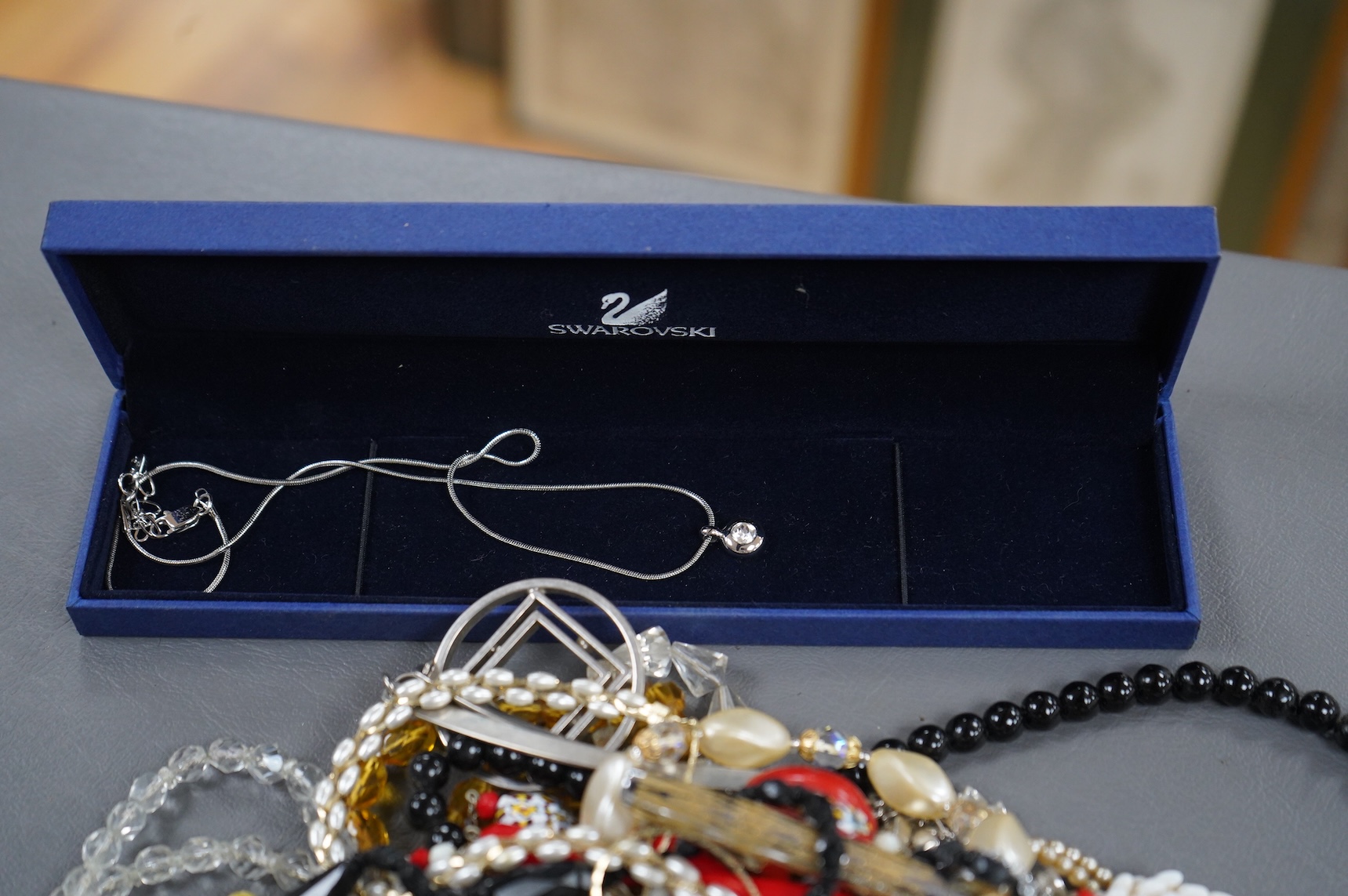 A large quantity of assorted costume jewellery.